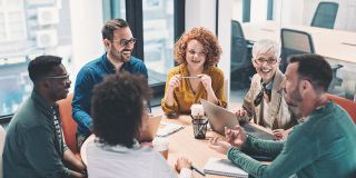 Colleagues talking in the office